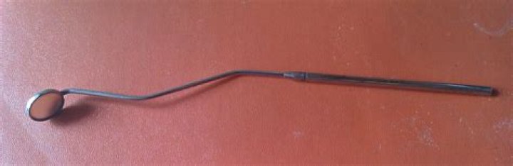 Instruments used in posterior rhinoscopy?